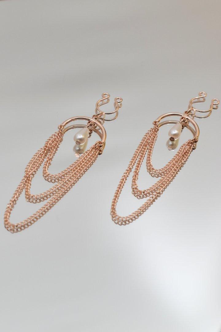 Bijoux de seins avec 3 chainettes doré rose et une perle