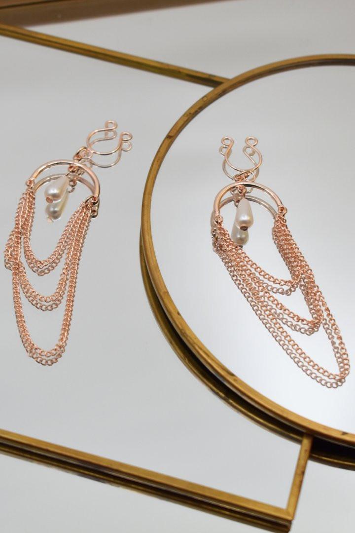 Bijoux de seins avec 3 chainettes doré rose et une perle