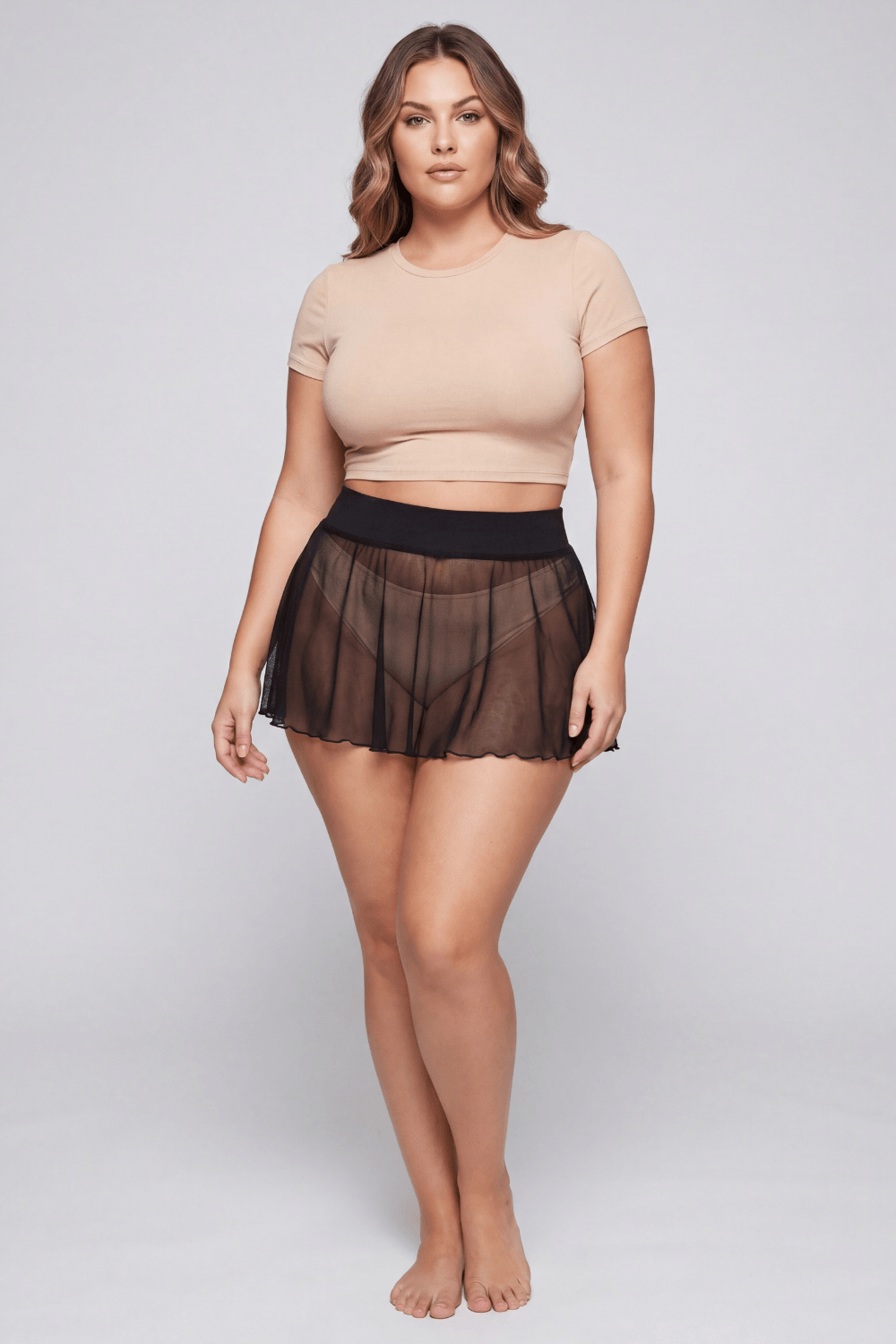 Mini jupe noire en résille transparente Stella