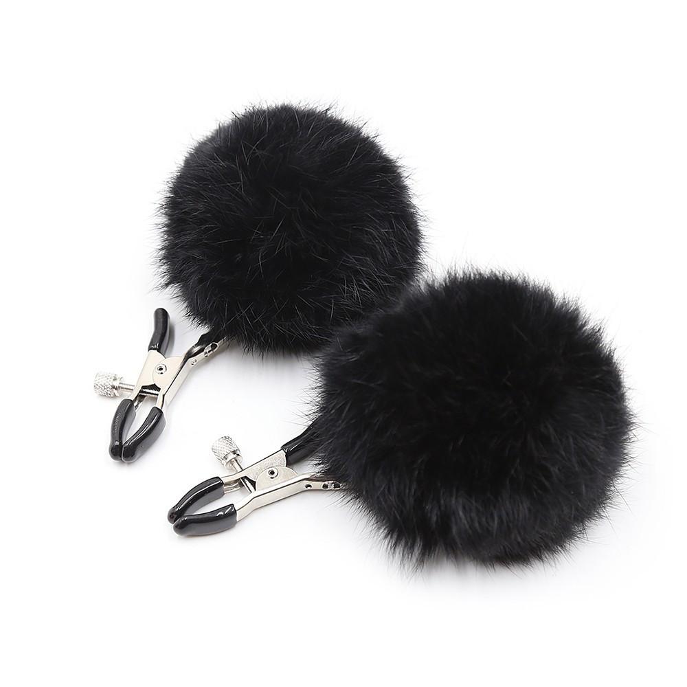 Pinces à seins avec pompoms noires